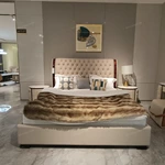 Diamond-Tufted Leather Bed with Curved High-Gloss Wood Side Borders